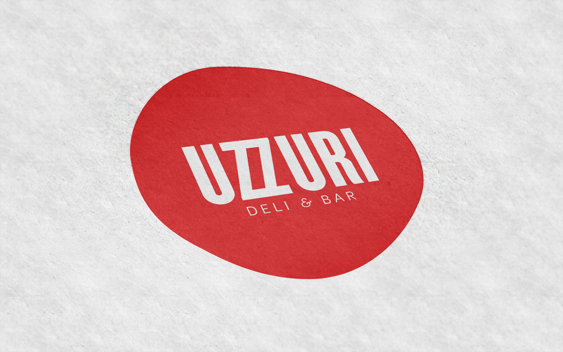 Uzzuri-mainlogoon-paper Uzzuri-mainlogoon-paper